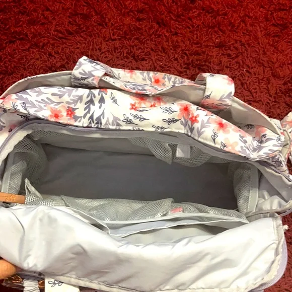 Ju-ju-be babybag, floral pattern typically for a girl.